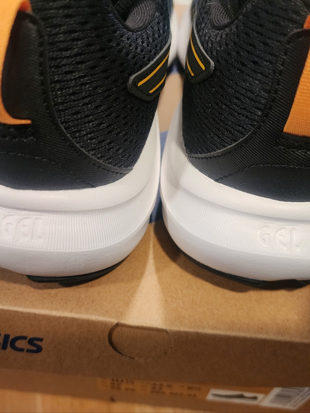 Asics Gel Contend 9 Black Running Shoes with Yellow & Blue Accents - Picture 3 of 7